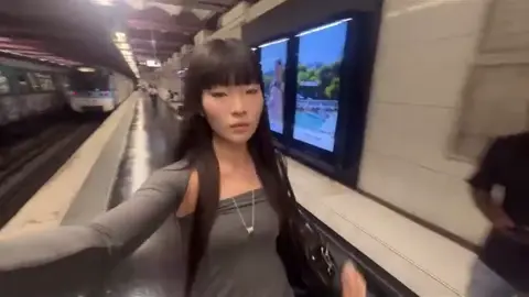 Clear face in a frame from the downloaded Higgsfield Selfie Walk source video.